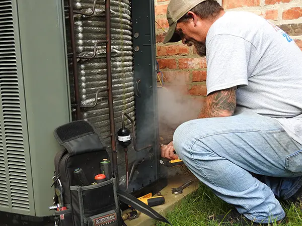Emergency AC Repairs: Refrigerant Leaks Need Immediate Attention 