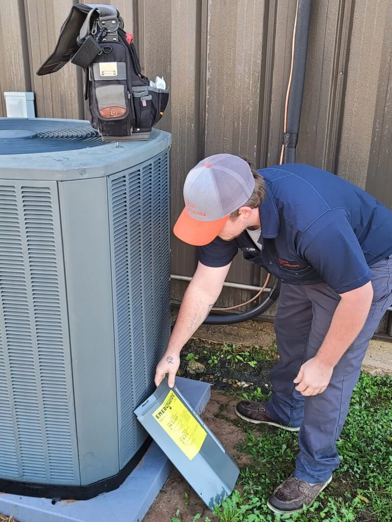 Air Conditioning Repairs: Caleb Checking on HVAC Unit 